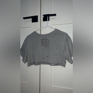 Grey crop top with styled rip